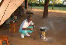 Man Cooking on Tipi Blaze Stove